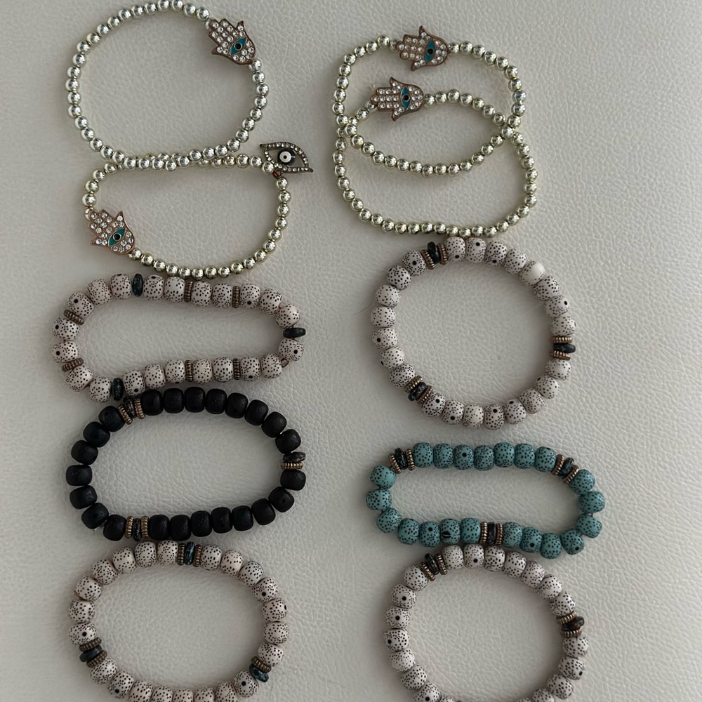 Set of 10 beaded bracelets with hamsa hand and evil eye charms